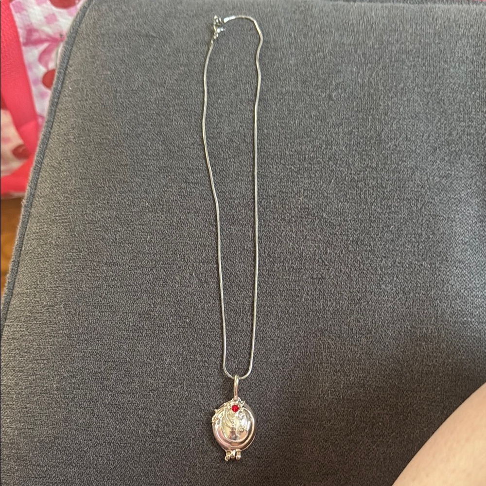 Elegant Silver Necklace with Red Gem